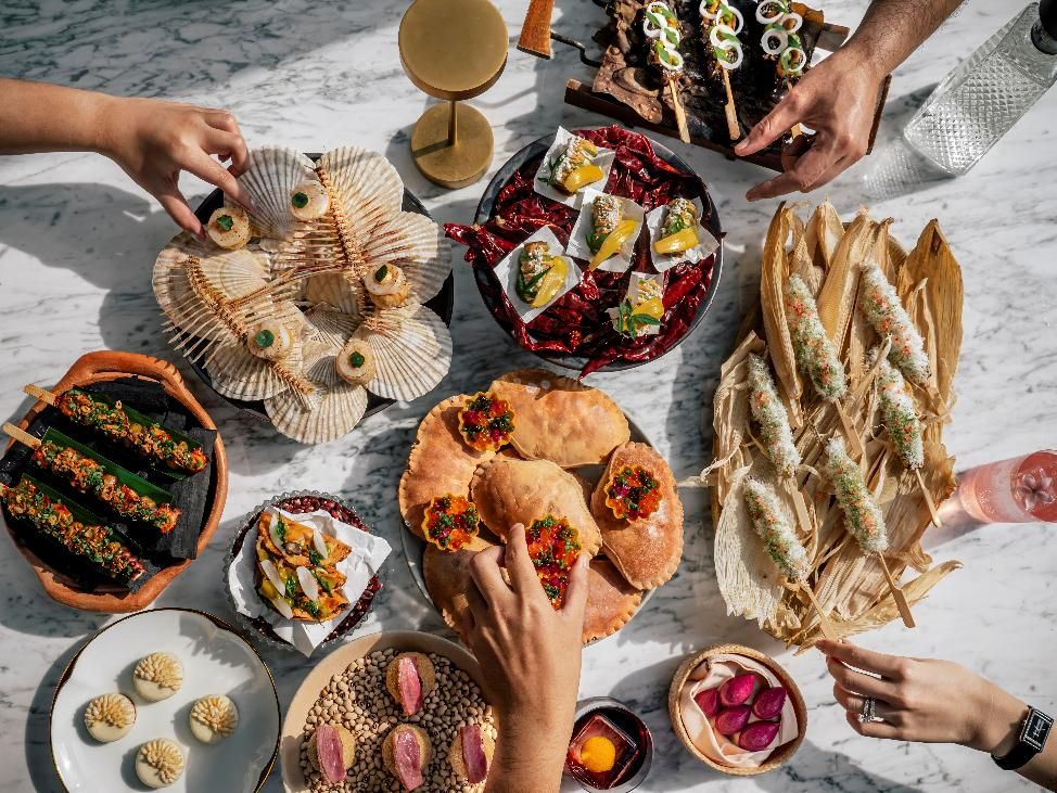 A table full of food AI-generated content may be incorrect.